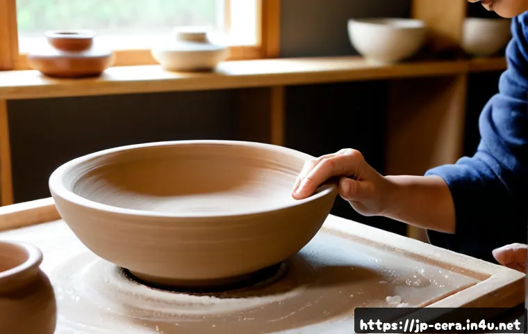 미술세라믹 이론 및 실습 방법 - Photorealistic ceramic arts workshop, an adult student shaping a smooth clay bowl on a pottery wheel...